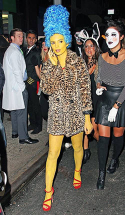 Stylish and adorable celebrity halloween costumes, Cat Costume Child: Halloween costume,  Kim Kardashian,  Kourtney Kardashian  