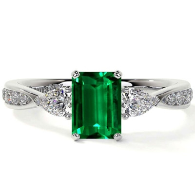 Natural Emerald Three Stone Emerald Cut Ring: 