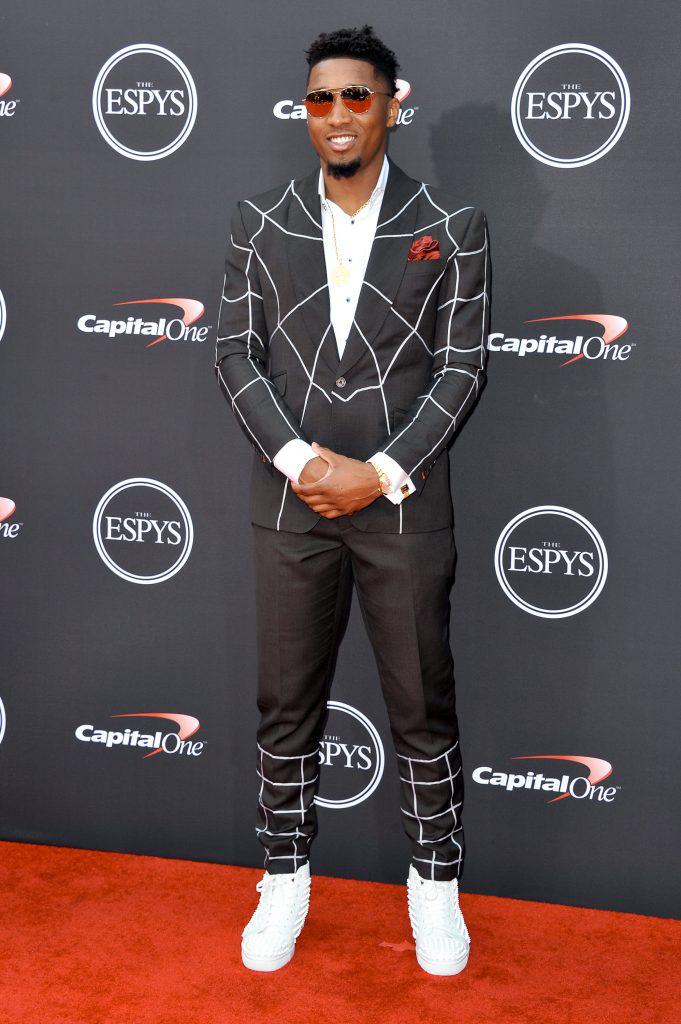 Donovan Mitchell in spider print suit.: 