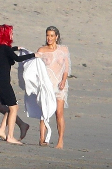 at the beach Kim Kardashian Photos: Beach outfit,  Most Famous Celebrity,  Kim,  Kardashian,  Cute Kim Kardashian,  Best Figure In The World,  Kim Kardashian Hairstyle,  Kim Kardashian Images,  Hot Kim Kardashian  