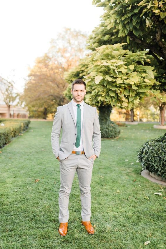 Graduating in full bloom means styling soft grey suits with a pop of green!: light grey suit green tie,  pocket square,  wedding suit,  Suit jacket,  knit tie  